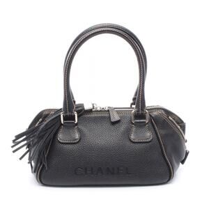 Chanel embossed tassel Handbag leather black